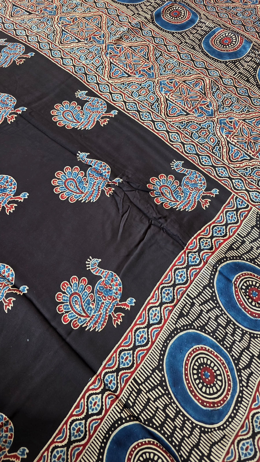 Black Ajrakh Modal Silk Saree with Peacock Buttas – Hand-Block Printed in Kutch