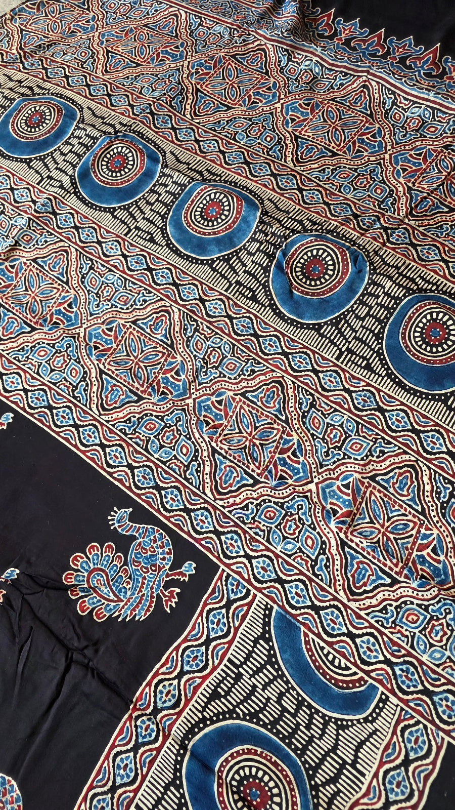 Black Ajrakh Modal Silk Saree with Peacock Buttas – Hand-Block Printed in Kutch