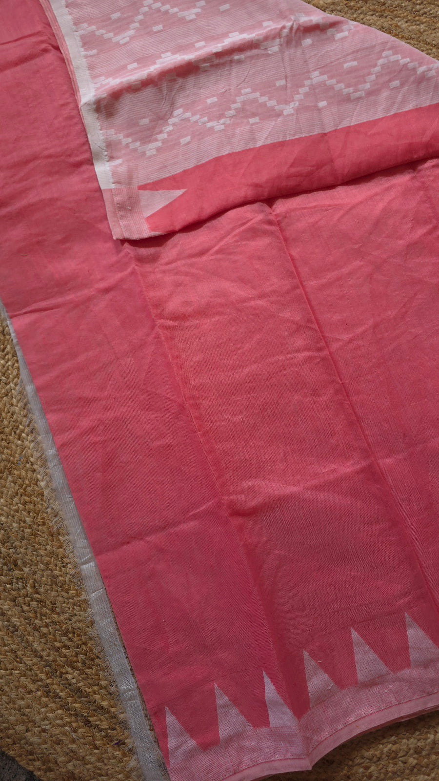 Coral Pink Jamdani-Style Saree with White Temple Border
