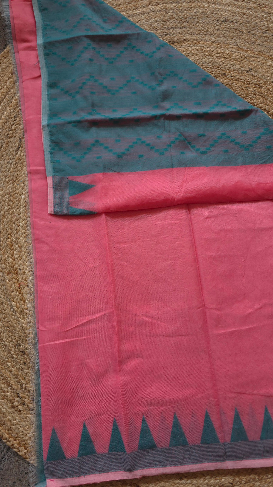 Coral Pink Jamdani-Style Saree with Teal Pallu and Temple Border